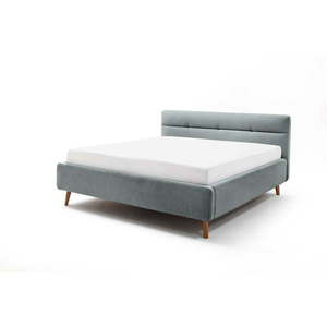 Svetlomodrá čalúnená dvojlôžková posteľ s úložným priestorom s roštom 180x200 cm Lotte – Meise Möbel vyobraziť