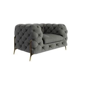 S-Style CHESTERFIELD KRESLO Lexi v sivej farbe so zlatými nohami vyobraziť