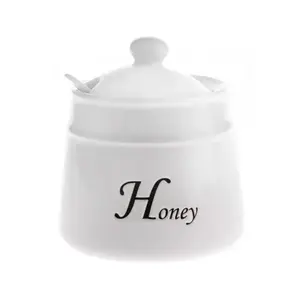 Dóza na med s lyžičkou Honey, biela keramika% vyobraziť