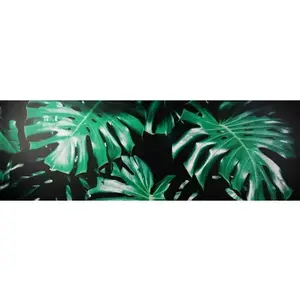 Obraz na plátne Zelené listy na čiernom pozadí, 150x50 cm% vyobraziť